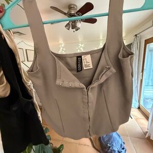 Divided Gray Sleeveless Tank Top with Bustier Design and Buttoned Closure